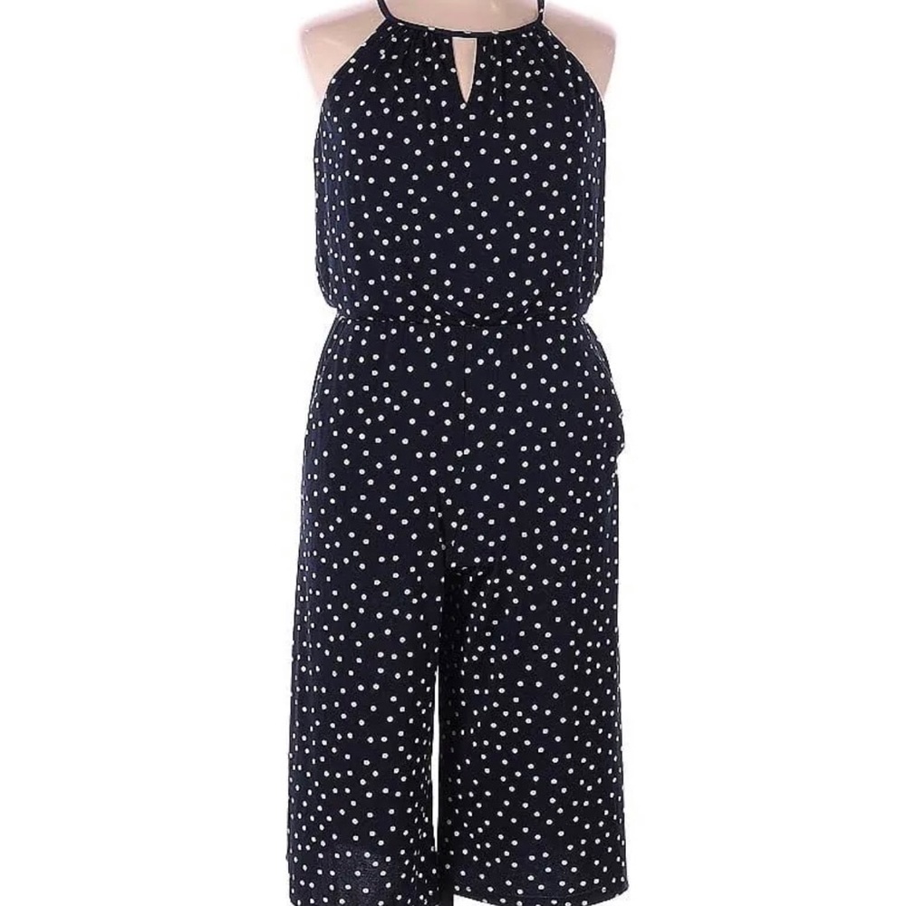 The picture is polka dots. The item is ALL BLACK.